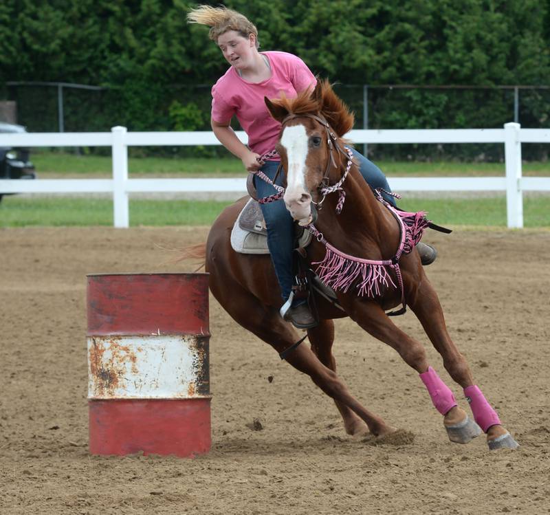 Lexi Moan, 16, of Amboy turns Digger in the 18-under barrel racing competition at the WHOA benefit horse show on Saturday, June 22, 2024 at the Whiteside County fairgrounds in Morrison.