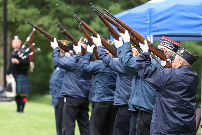 The shells fly as members of the DeKalb American Legion Honor Guard fire three volleys Monday, May 27, 2024, during the DeKalb Memorial Day program at Ellwood House.