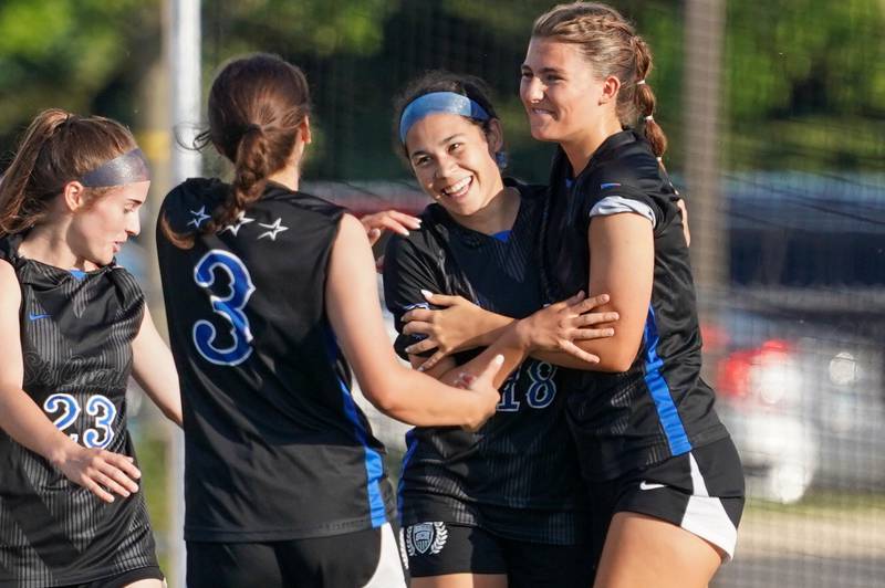 St. Charles North's Juliana Park (center) smiles after scoring a goal against Batavia during a Class 3A Batavia Regional final soccer match at Batavia High School in Batavia on Friday, May 17, 2024.