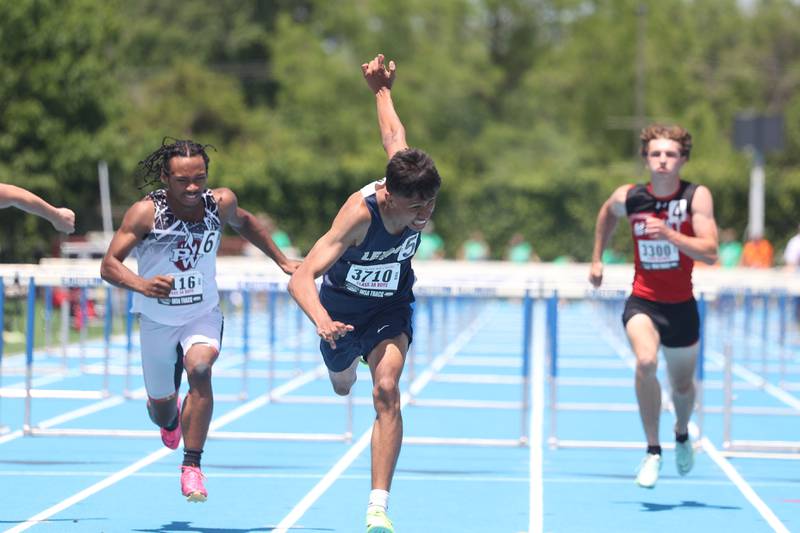 Lemont’s Quinton Peterson lunges forward for 2nd place finish in the Class 3A 110m Hurdles State Championship on Saturday, May 25, 2024 in Charleston.