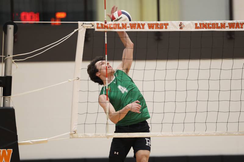 Providence’s Christo Krabbe hits a shot against Lincoln-Way West on Wednesday, April 3, 2024 in New Lenox.