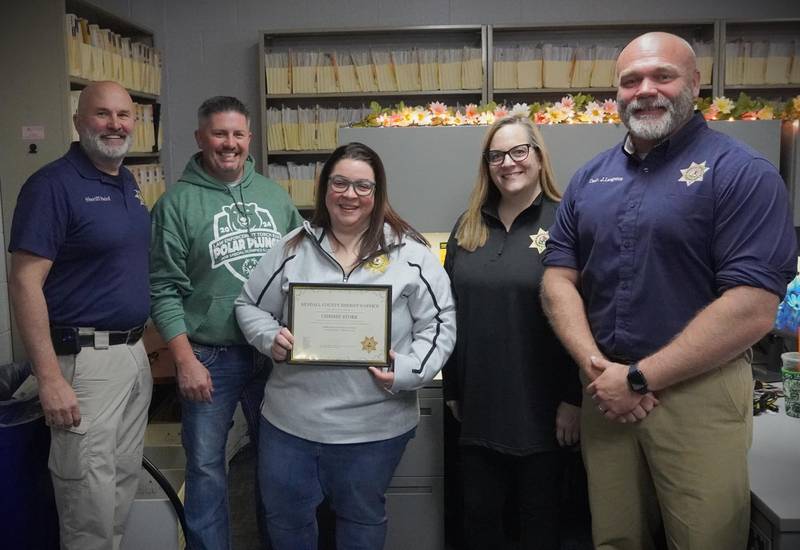 (Pictured from left)  Kendall County Sheriff Dwight Baird, Undersheriff Bobby Richardson, transcriptionist Chrissy Stork, records manager Bowen, and Commander Langston.