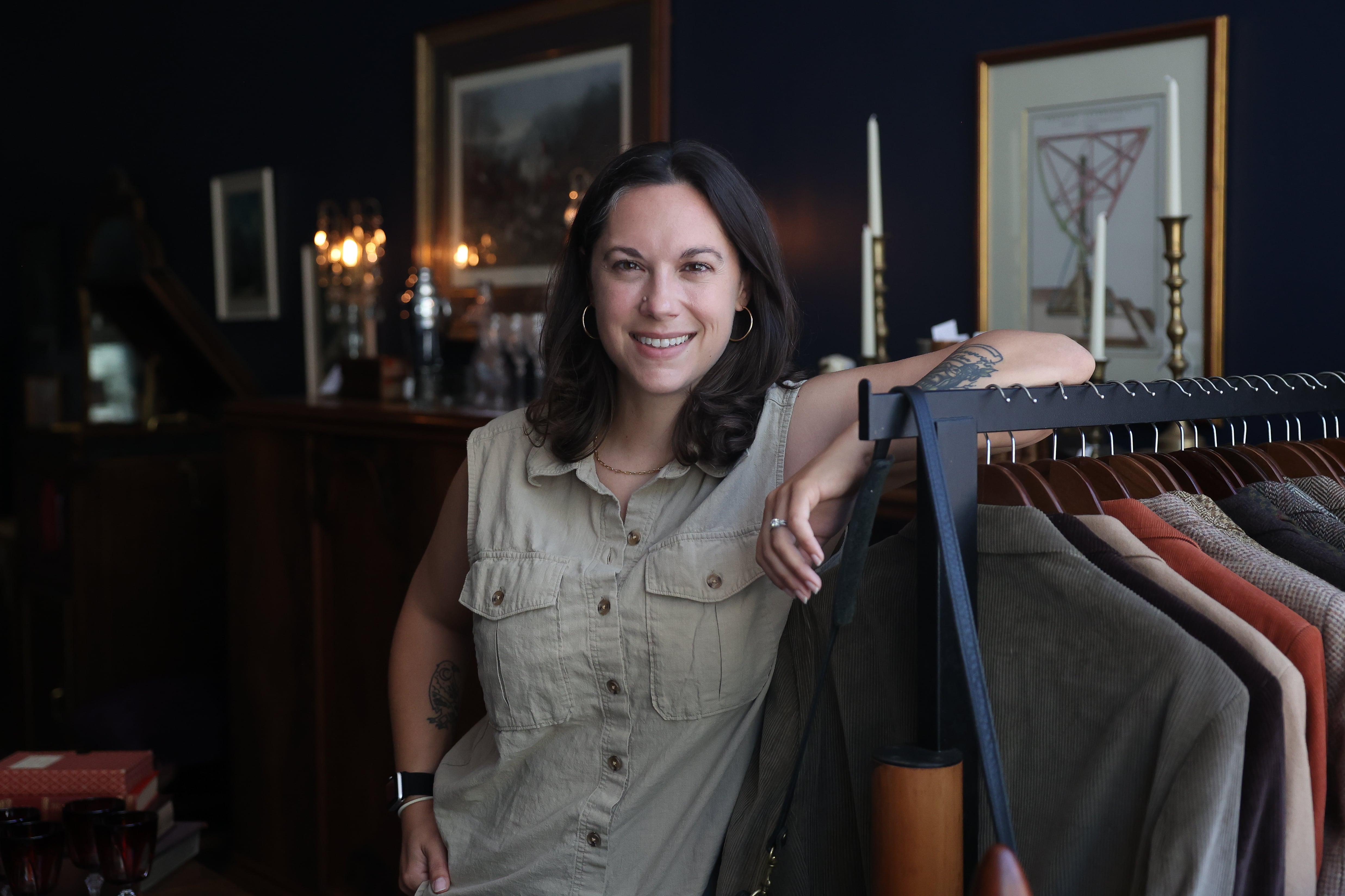 Emily Brzycki, owner of Black Cat Curiosities, poses for a photo at her store in downtown Joliet on Wednesday, July 31, 2024.