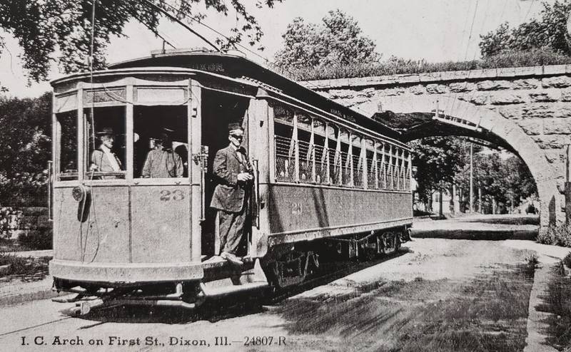 An interurban car is shown near the West First Street viaduct in Dixon, circa 1910.
