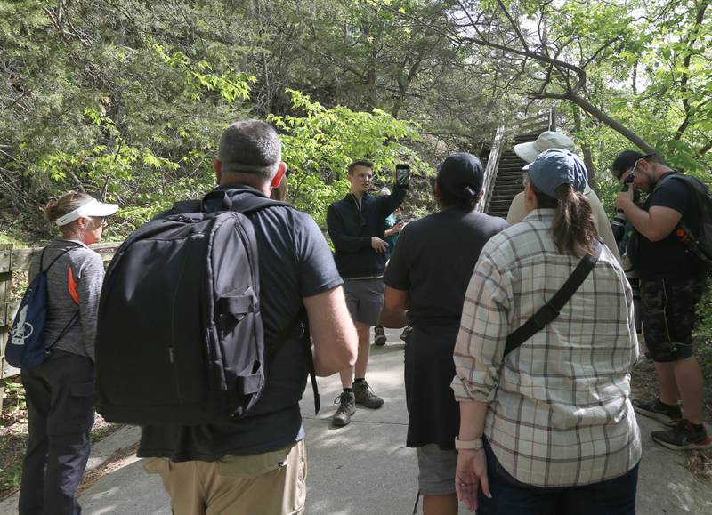 Matthew Klein engages with photographers how to photograph an image during the Capturing the Experience: Photo Hike with Matthew Klein on Sunday, May 7, 2023 at the Starved Rock Visitors Center. The free session included free tips for capturing the outdoor experience and a small hike to the top of Starved Rock.