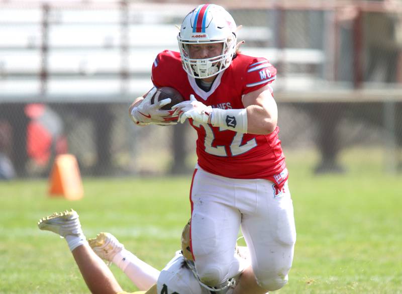 Marian Central’s  Andrew Thielsen runs the ball against Bishop McNamara in varsity football action on Saturday, Sept. 14, 2024, at George Harding Field on the campus of Marian Central High School in Woodstock.