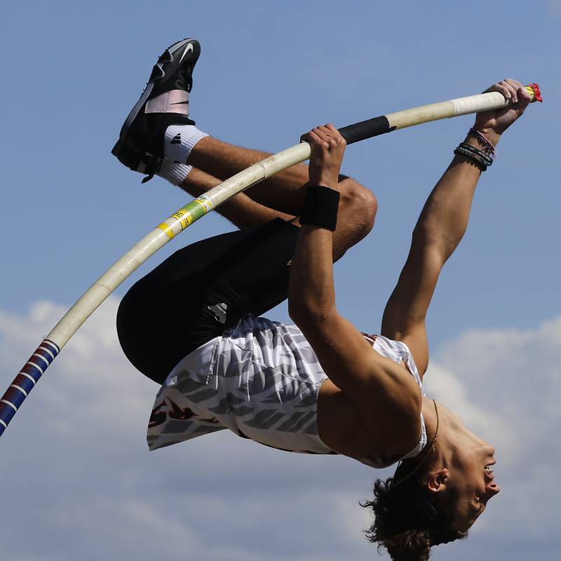 McHenry’s Zachary Galvicius pole vaults Friday, April 21, 2023, during the McHenry County Track and Field Meet at Cary-Grove High School.