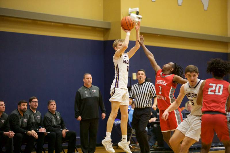 Serena's Carson Baker puts the shot up over Aurora Christian's Marshawn Cocraft at the Class 1A Boy's Basketball  Super Sectional on Friday , March 1, 2024 at Harvest Christian Academy  in Elgin.