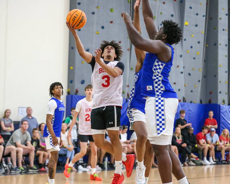 Benet's Blair Fagbemi (3) puts up a shot under the basket at the Riverside-Brookfield Summer Shootout basketball tournament. June 22, 2024.