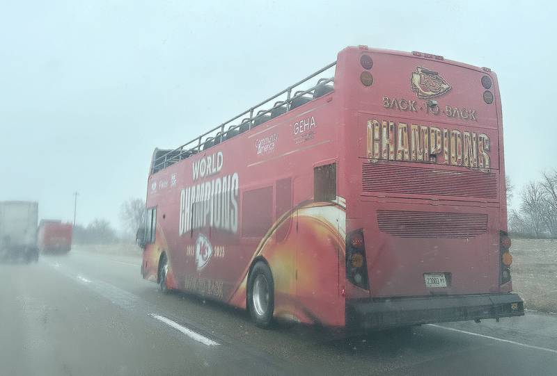Eight Kansas City Chiefs double-decker buses travel Interstate 80 Eastbound on Friday, Feb. 16, 2024 in Bureau County. The busses came from all over the country to be in the Super Bowl parade.