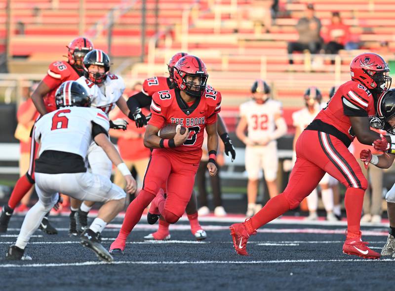 Bolingbrook's Jonas Williams scrambles for a first down during a non-conference game against Lincoln-Way Central on Friday, Sep. 29, 2023, at Bolingbrook. (Dean Reid for Shaw Local News Network)