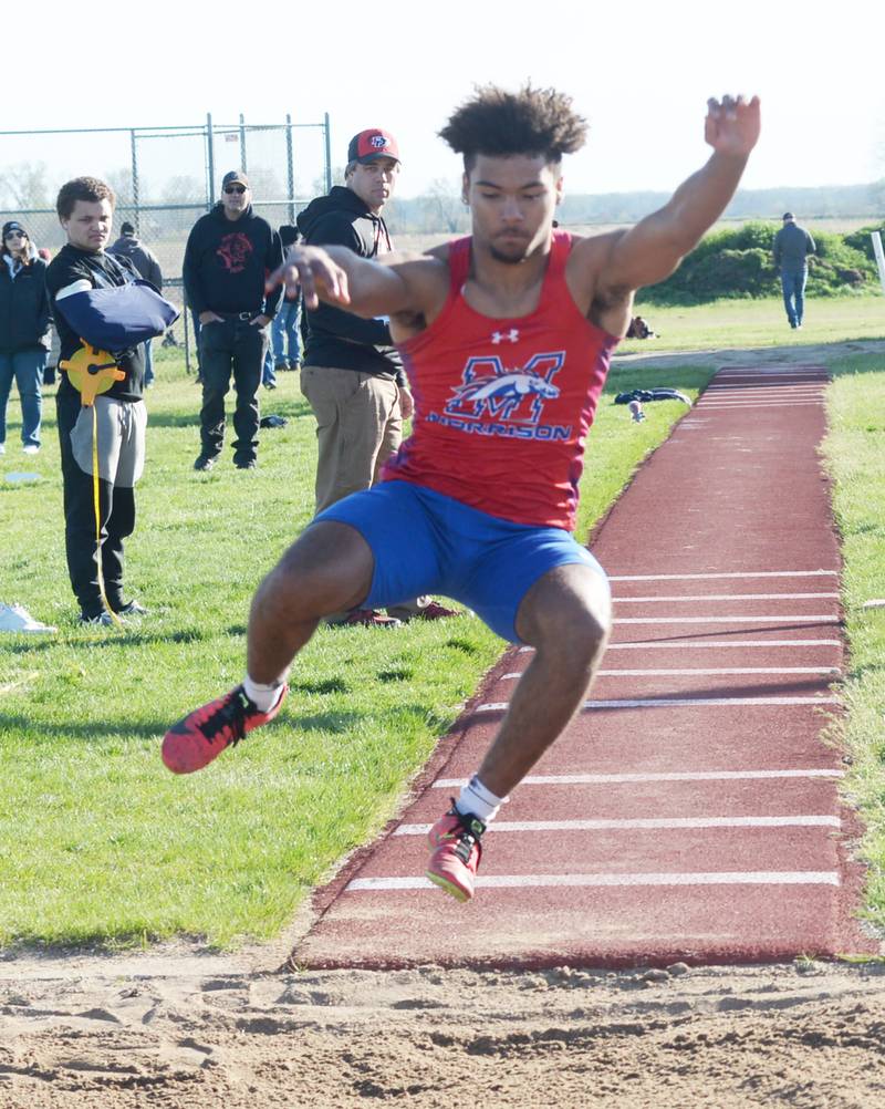 Morrison's Daeshaun McQueen competes in the triple jump at the Ed Schmidt Invitational Track Meet at Erie High School on Friday, April 19, 2024.