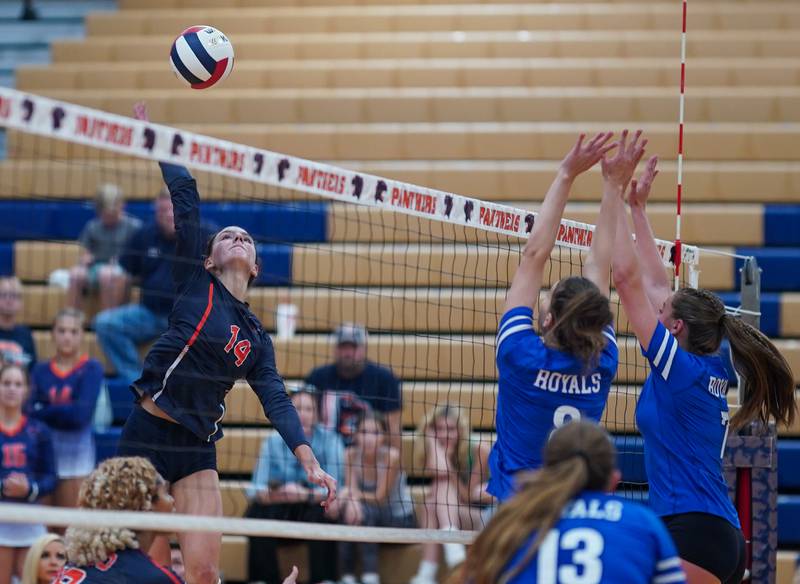 Oswego’s Mia Jurkovic (14) goes up for a kill against Rosary during a volleyball match at Oswego High School on Tuesday, Aug 29, 2023.