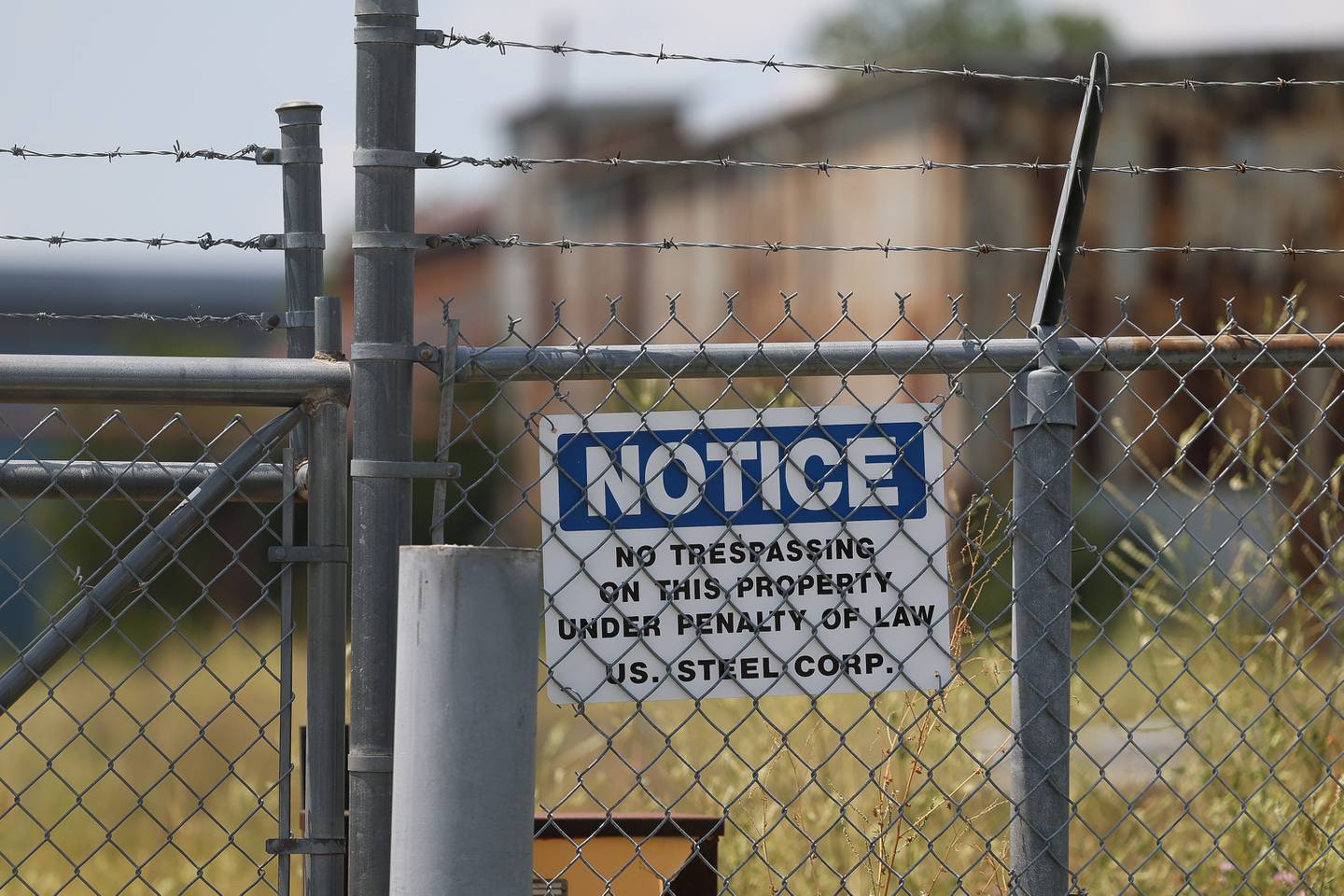 A No Trespassing sign is posted on the gate of the abandoned U.S. Steel Mill on Saturday July 13, 2024 in Joliet.