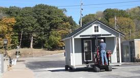 Photos: Utica moves huts into retail plaza area