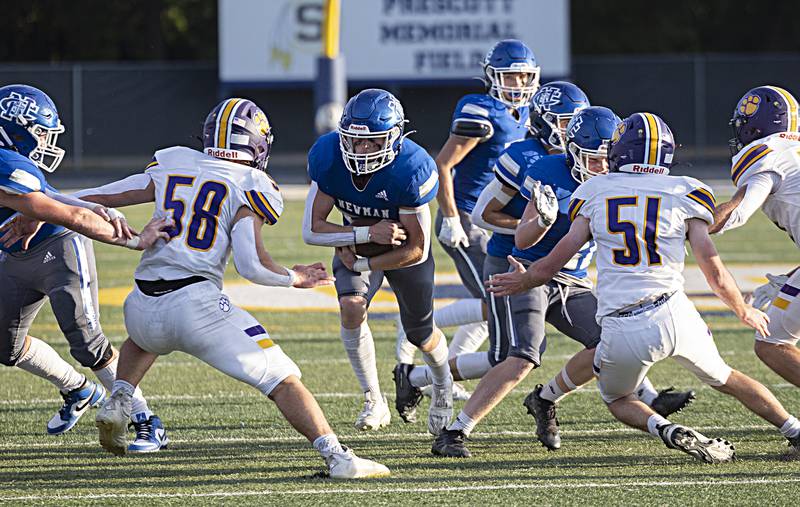 Newman’s Daniel Kelly runs the ball up the middle against Sherrard Saturday, Sept. 2, 2023 in a game at Sterling High School.