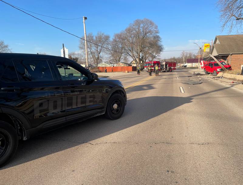 Norris Drive in Ottawa was closed the morning of Wednesday, Feb. 21, 2024, as police and firefighters cleared a pickup truck that had collided with a utility pole near Sam's Pizza. The truck did not strike Sam's building.