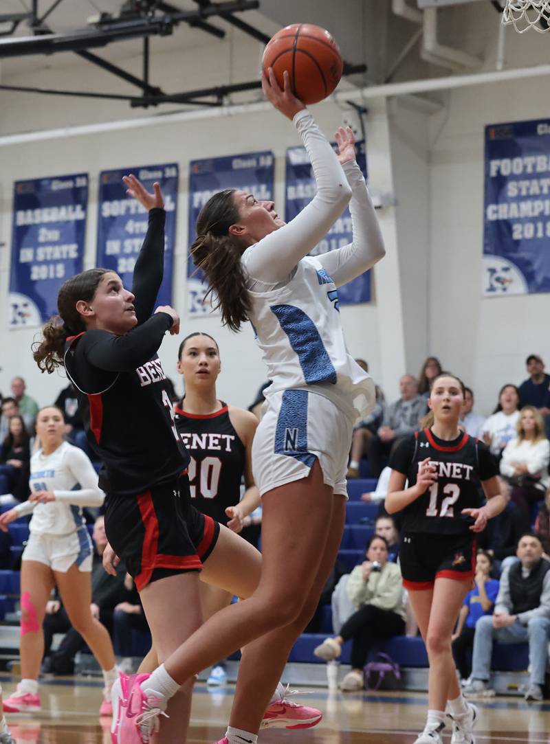 Nazareth’s Danielle Scully (23) puts up a shot against Benet during a girls varsity basketball game on Monday, Jan. 29, 2024 in La Grange Park, IL.