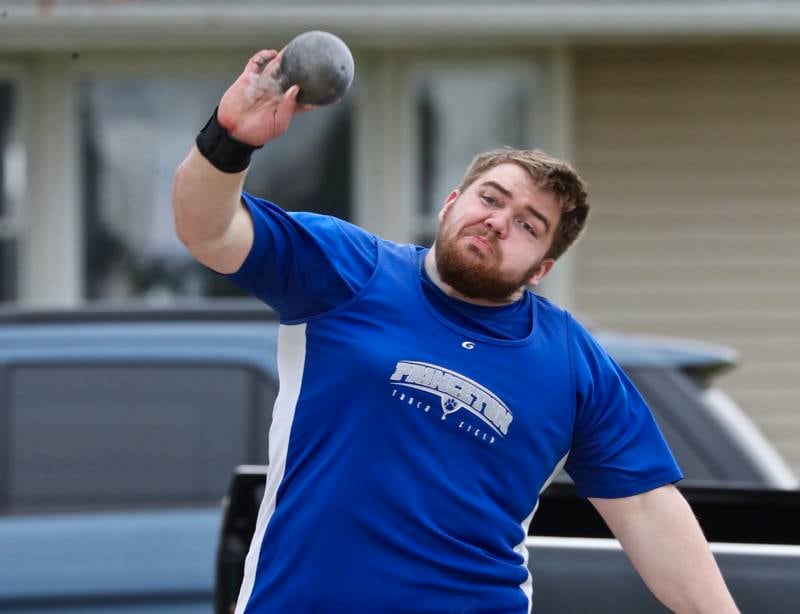 PHS' Payne Miller throws the shot put in Monday's Howard-Monier Invitational at Princeton.