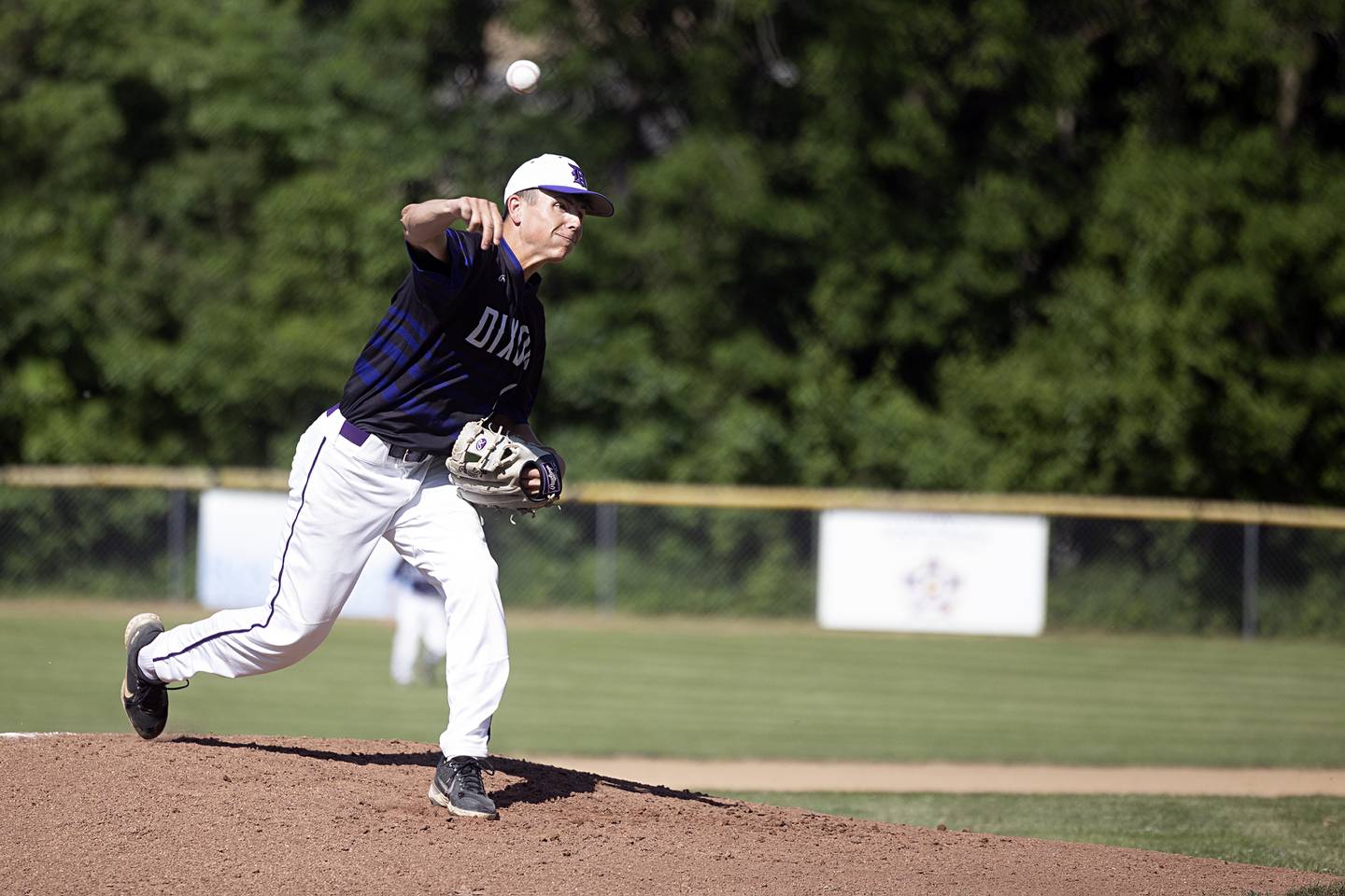 Dixon’s Alex Harrison fires a pitch against Freeport Thursday, May 23, 2024 during the Class 3A regional semifinal in Dixon.