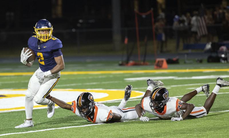 Sterling’s Kaedon Phillips fields a punt against United Township Friday, Sept. 13, 2024, at Sterling High School.