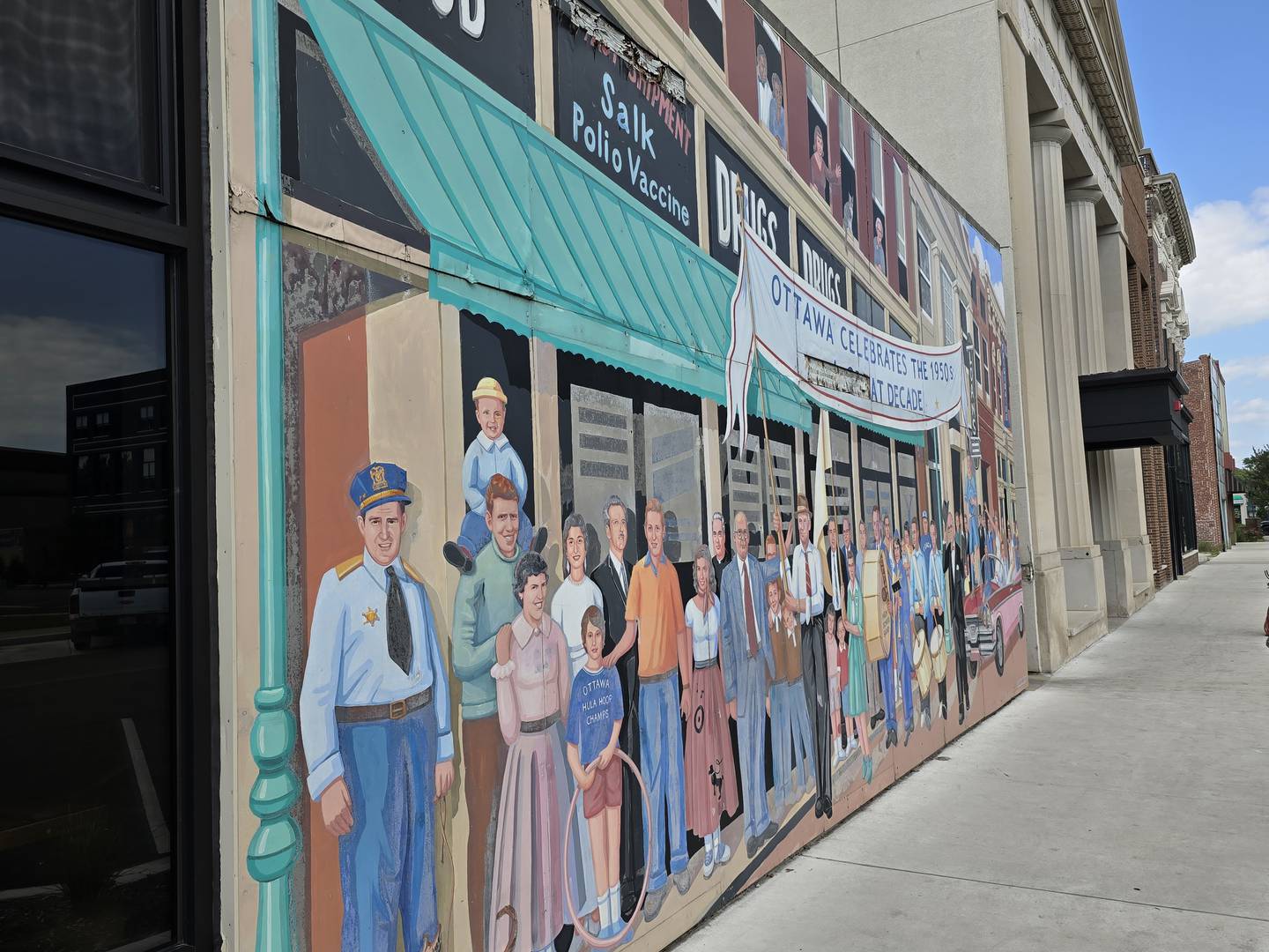 The "Streetscape Reflections" mural in downtown Ottawa is scheduled to be taken down, after it was determined it was not able to be repaired.