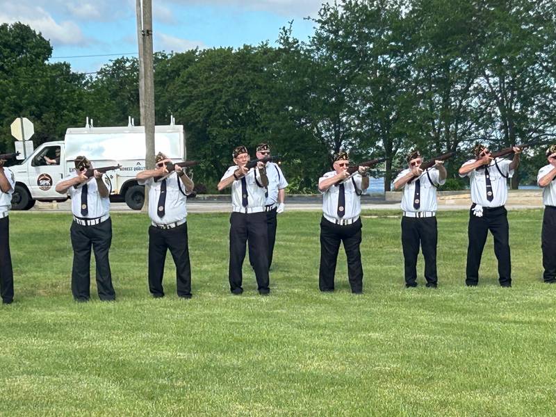 A gun salute Monday in Rock Falls honored military members killed while serving the nation. The gun salute was given after a plaque commemorating the Traveling Vietnam Memorial Wall display was dedicated in the RB&W District.