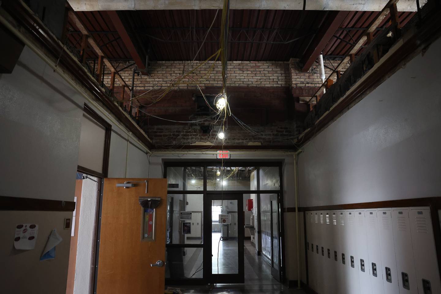 The wall of the original 1932 Lockport Township High School Central Campus building can be seen after crews took down sections of the ceiling in the 1952 addition.