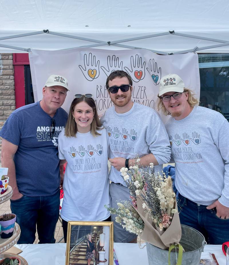 The Holzer family (from left to right: Mike, Melanie, Nicholas and Jacob) honors the legacy of mother and wife Brenda Holzer with the Brenda Holzer Memorial Foundation.