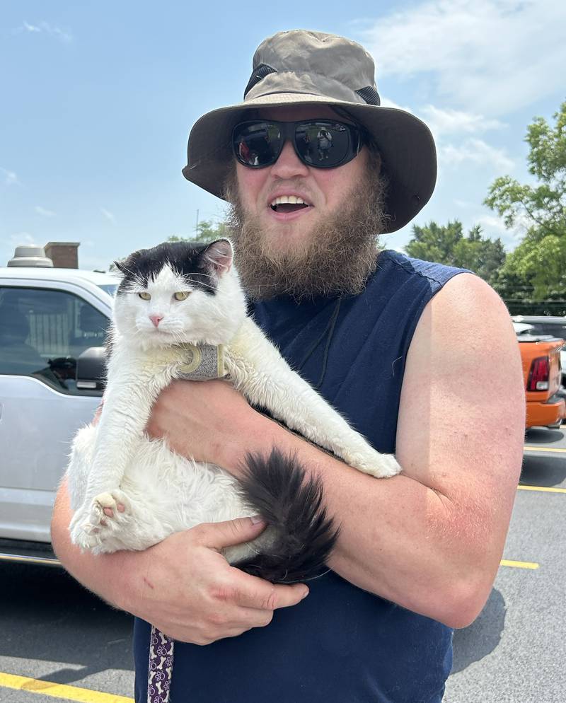 Adam Newman of Belvidere brought his cat, Oreo Dozer to the Hib Reeber Car Show held at ByronFest on Saturday, July 13, 2024 in Byron.