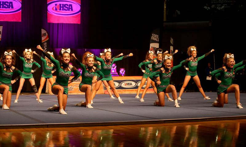 Members of the Providence Catholic cheer team perform during the IHSA Cheer State Finals in Grossinger Motors Arena on Saturday, Feb. 4, 2023 in Bloomington.