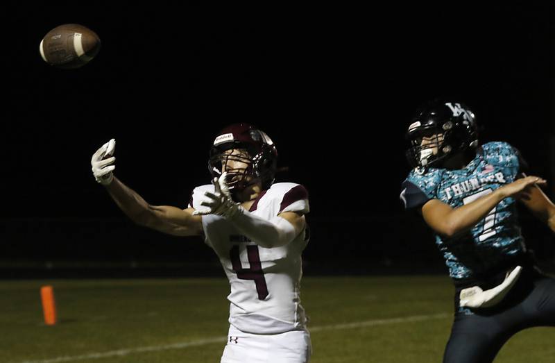 Marengo's Parker Mandelky can’t come up with the catch in the end zone  as he is defended by Woodstock North's Parker Halihan during a Kishwaukee River Conference football game on Friday, Sept. 13, 2024, at Woodstock North High School.