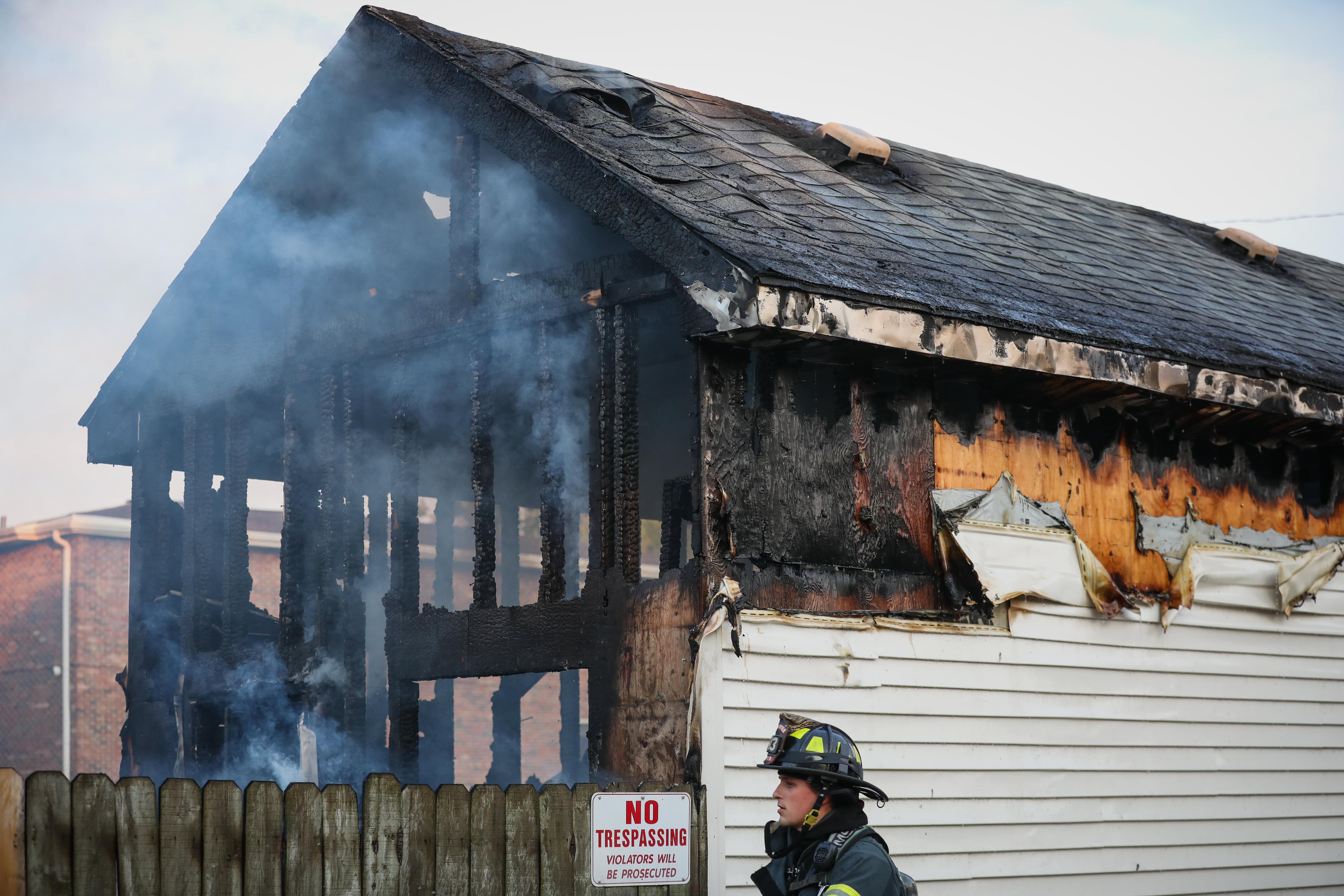 Firefighters extinguish a detached garage fire within 10 minutes in Woodstock Saturday evening.