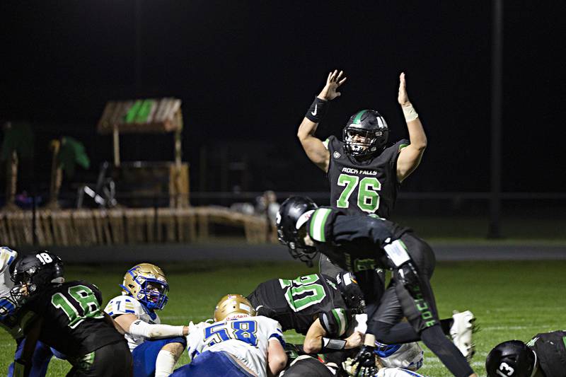 Rock Falls’ Xzavier Geiger signals a score as the Rockets take the lead against Rockford Christian Friday, Sept. 22, 2023 in Rock Falls.