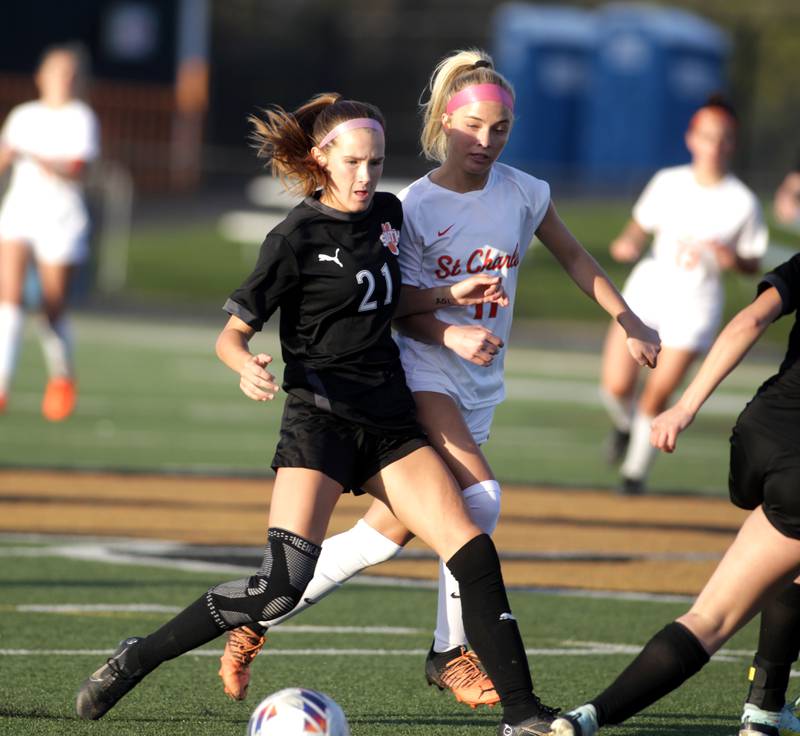Wheaton Warrenville South’s Ashlyn Adams gets control of the ball during a 2023 game against St. Charles East in Wheaton.
