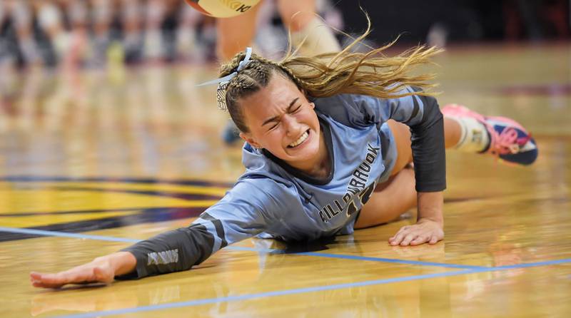 Willowbrook’s Elle Bruschuk dives for a Barrington shot in the Class 4A girls volleyball state third-place match at Illinois State University in Normal on Saturday, October 11, 2023.