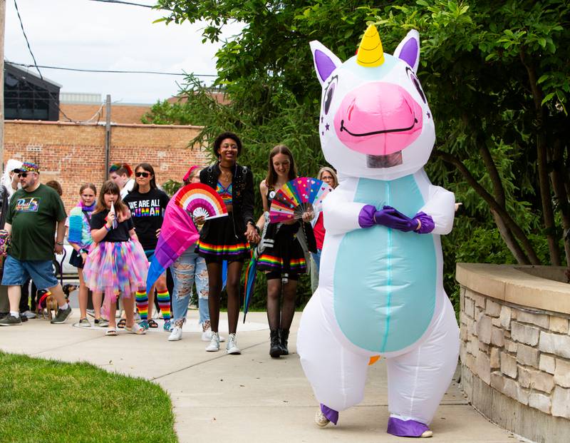 A contestant dressed as an inflatable unicorn lines up for the dog and human parade during the Downer’s Grove Pride Fest on Saturday, June 8, 2024.

Suzanne Tennant/For Shaw Local News Media