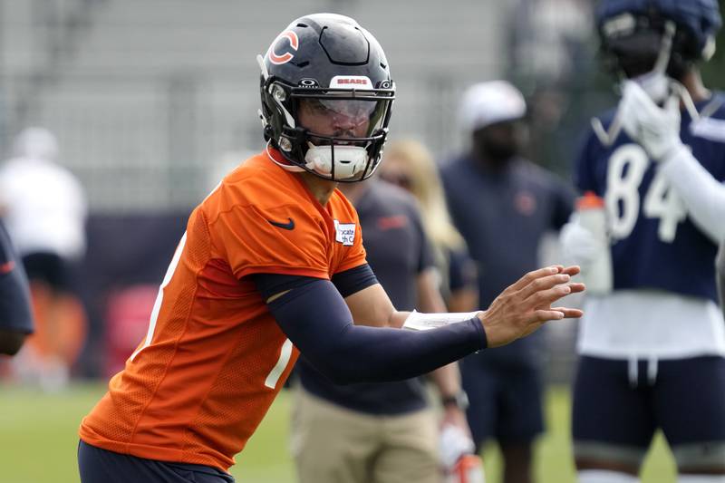 Chicago Bears quarterback Caleb Williams waits for a pass during an NFL football training camp practice in Lake Forest, Ill., Monday, July 22, 2024. (AP Photo/Nam Y. Huh)