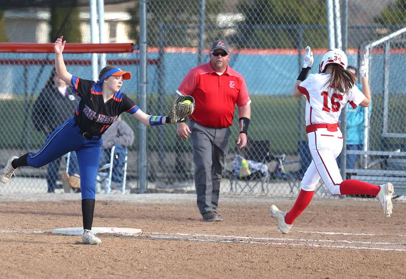Genoa-Kingson's Lillian Provost has to come of the base to take a throw as Oregon's Kaelin Shaffer ends up safe at first during their game Tuesday, April 9, 2024, at Genoa-Kingston High School.