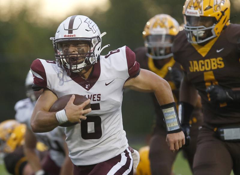 Prairie Ridge's Luke Vanderwiel runs for a touchdown during a Fox Valley Conference football game against Jacobs on Friday, Aug 30, 2024, at Jacobs High School in Algonquin.