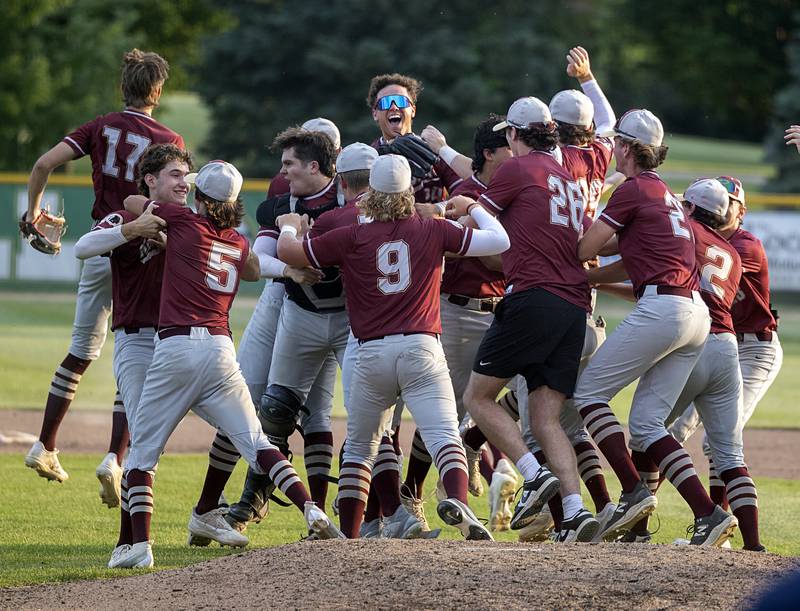 Morris celebrates their 5-3 win over Sycamore Monday, June 3, 2024 in the Class 3A Geneseo supersectional.