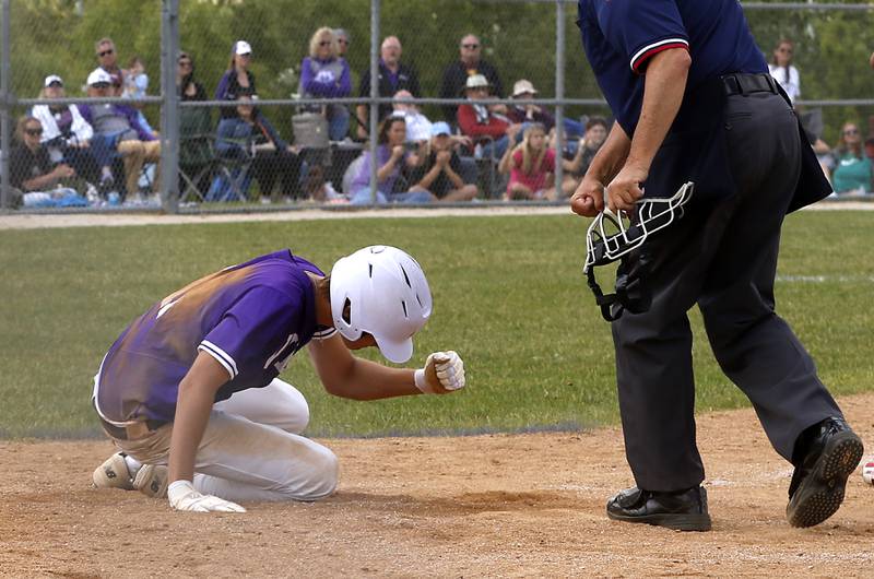 Hampshire's Charles Wiggins pounds on the plate after he was tag out a home during a Class 4A Hampshire sectional baseball game against McHenry on Wednesday, May 29, 2024, at the Hampshire High School.