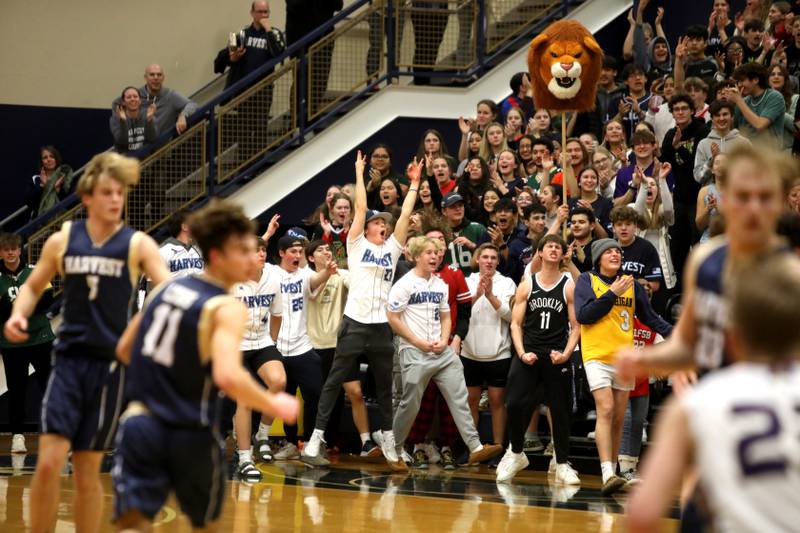 Harvest Christian Academy fans go wild during the Class 1A Harvest Christian Academy Sectional semifinal game against Serena on Wednesday, Feb. 28, 2024 in Elgin.