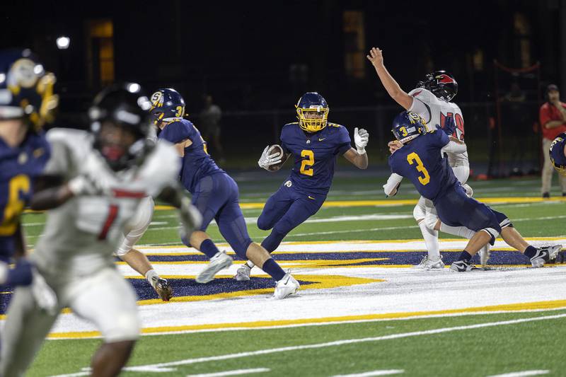 Sterling’s Kaedon Phillips runs back a kick-off against Metamora Friday, Aug. 30, 2024 at Sterling High School.