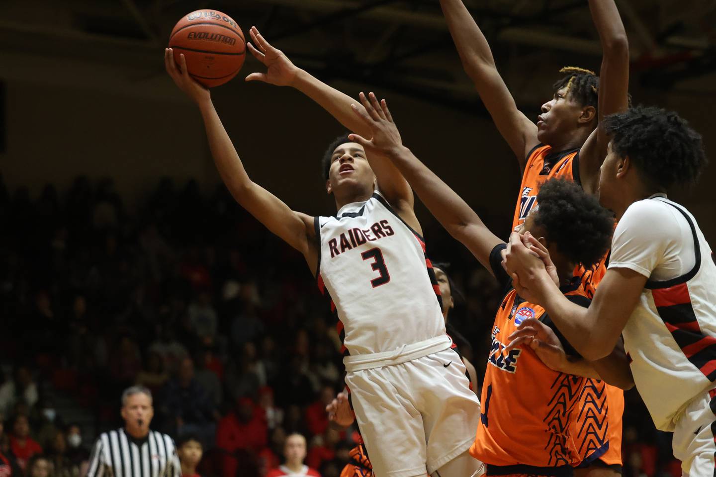 Bolingbrook’s Davion Thompson goes in for the basket against Romeoville on Wednesday, Jan. 3rd, 2024 in Bolingbrook.