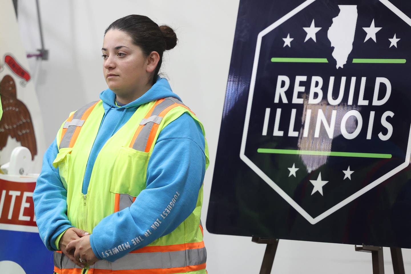 Illinois Department of Transportation stands by a Rebuild Illinois sign at a press conference on reaching a key milestone for the  $1.3 Billion I-80 corridor project on Wednesday, Nov. 1, 2023 at Joliet Junior College.