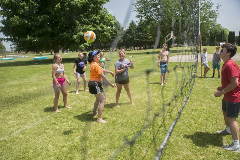 Dixon Park District SPARK campers play a game of volleyball Wednesday. There were 170 participants in the day's activities.