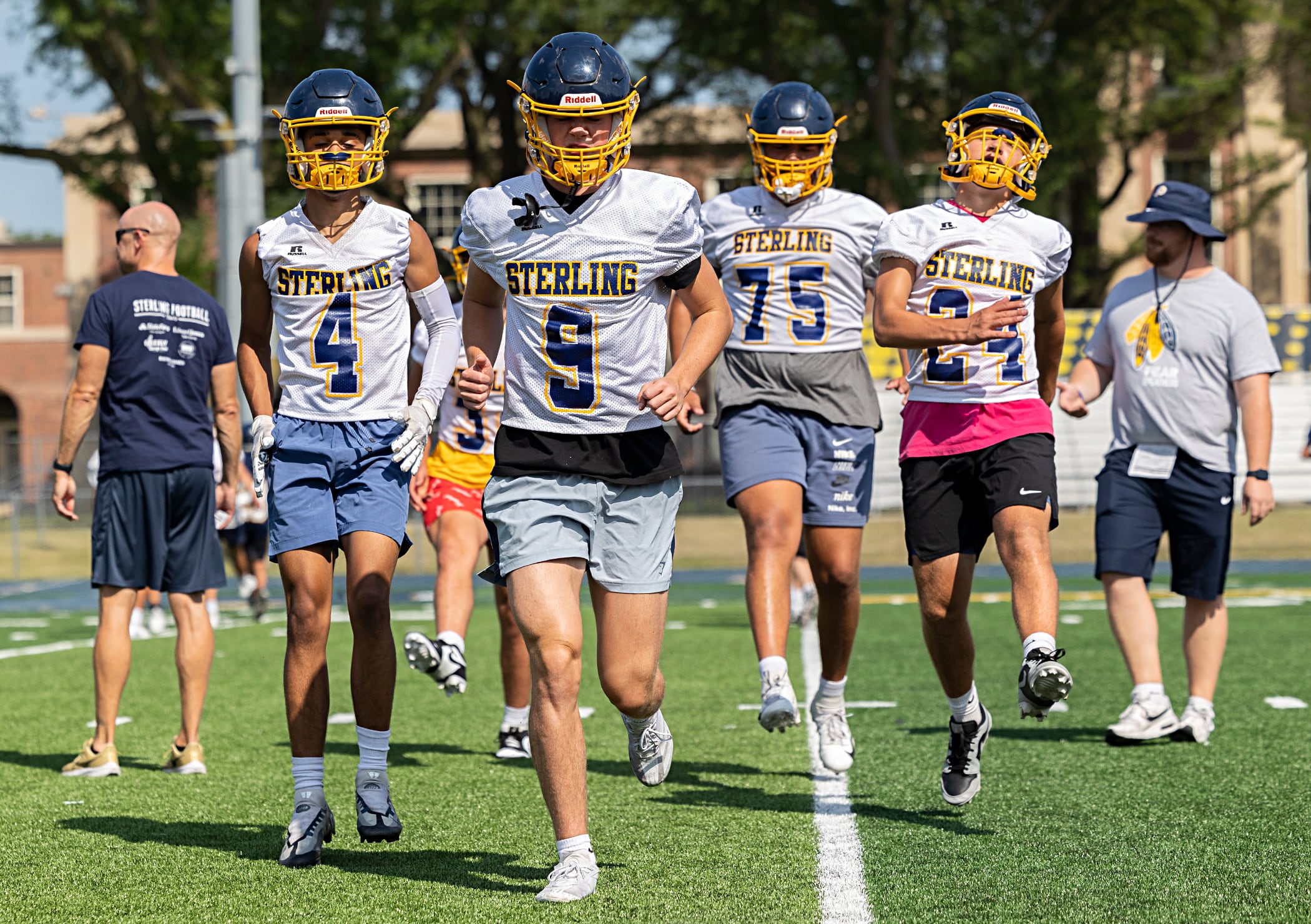 Sterling’s Jimmy Wadsworth leads teammates in drills Tuesday, Aug. 13, 2024 during the first week of football practice.