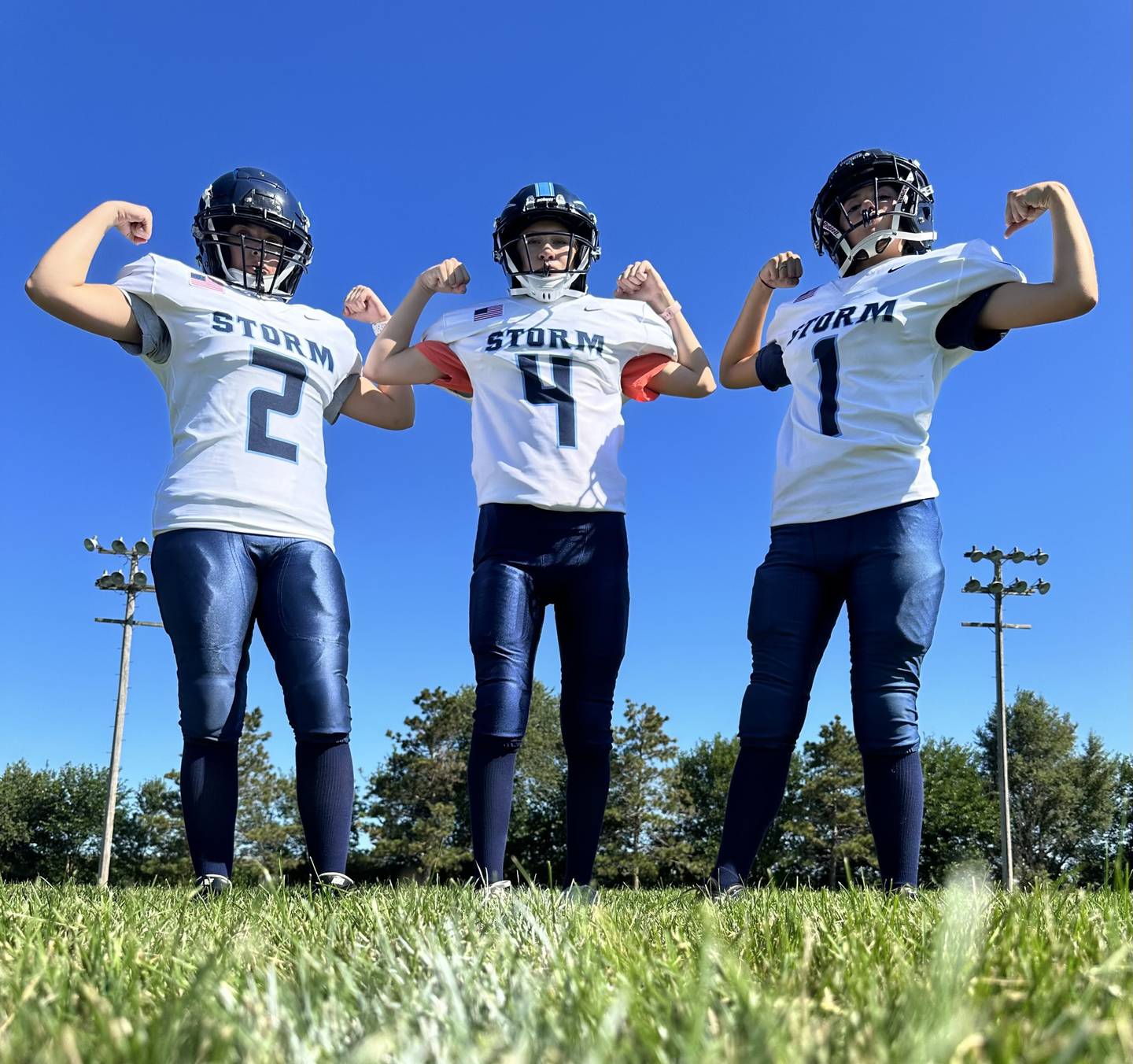 Bureau Valley managers Taylor Rowland (from left), Ryley Egan and Makenna Maupin had a tradition of suiting up in full pads on the first day of practice each fall. Maupin will be an equipment manager for the Iowa State University football team this fall.