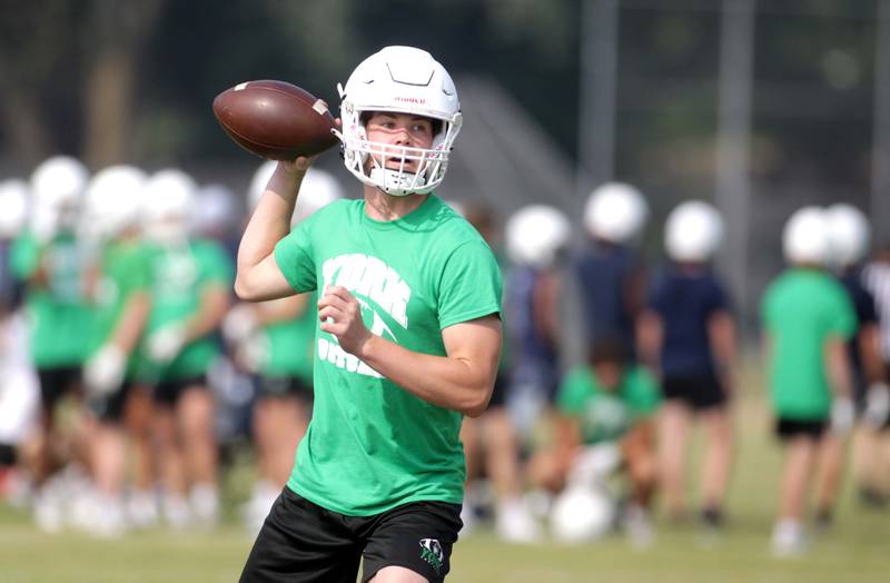 York quarterback Sean Winton looks to throw the ball during a 7-on-7 football tournament game against Oswego at West Aurora High School on Friday, June 23, 2023.